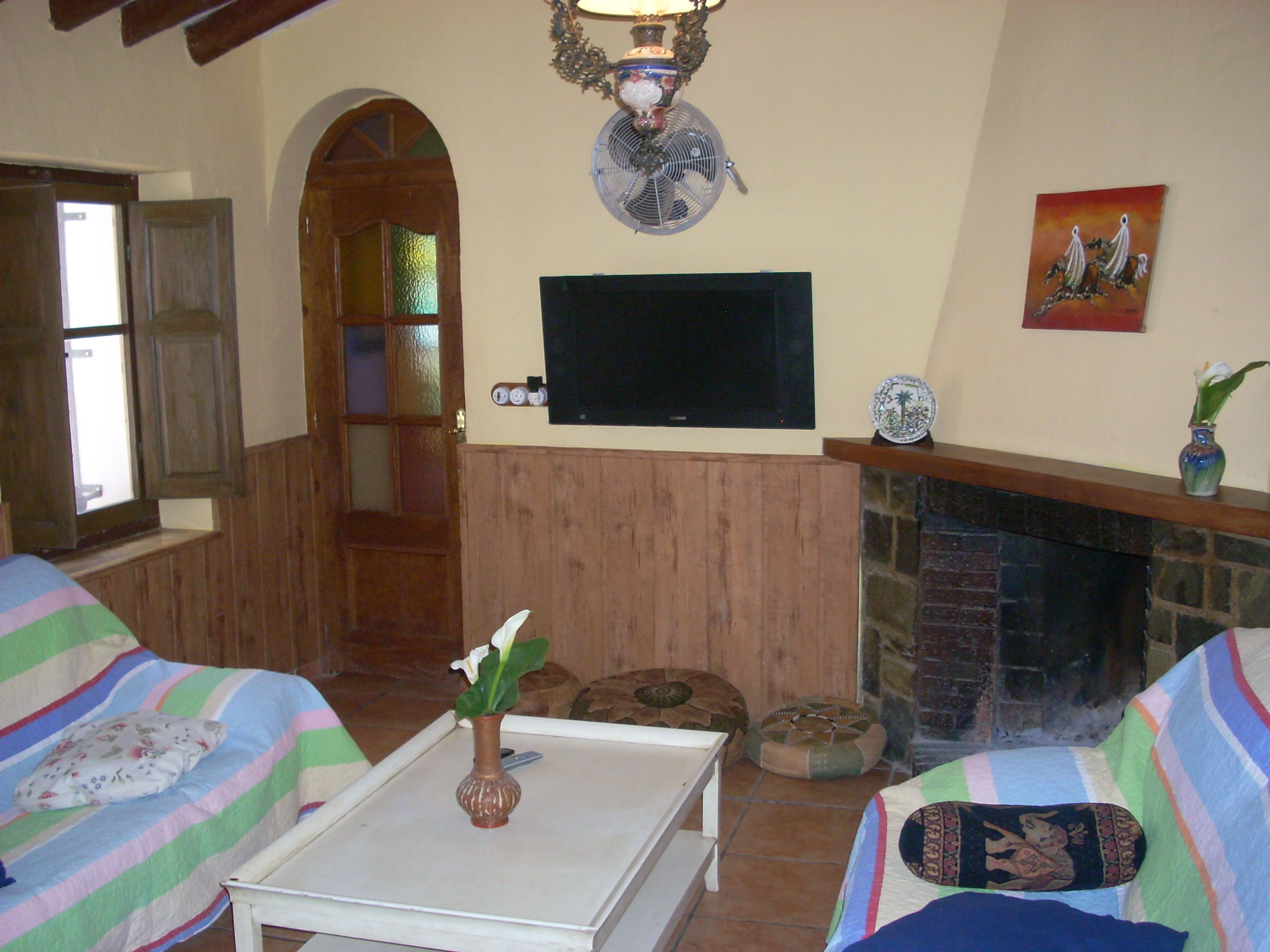 Salón con chimenea de Casa de la Cuesta